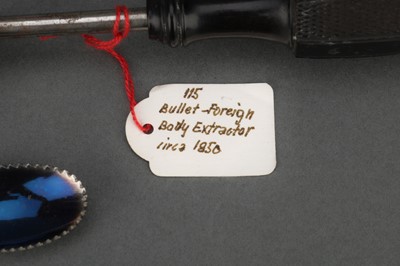 Lot 35 - Three Bullet Extractors