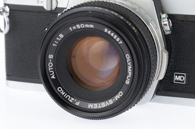 Lot 213 - An Olympus OM-1 SLR Camera