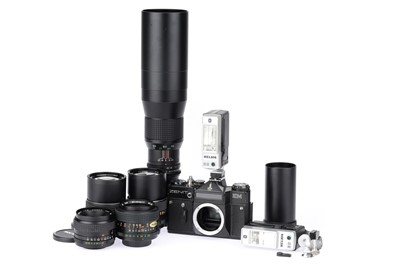 Lot 95 - A Zenit EM 35mm SLR Camera Outfit